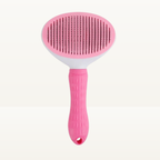 Brosse auto-nettoyante rose pour chien et chat