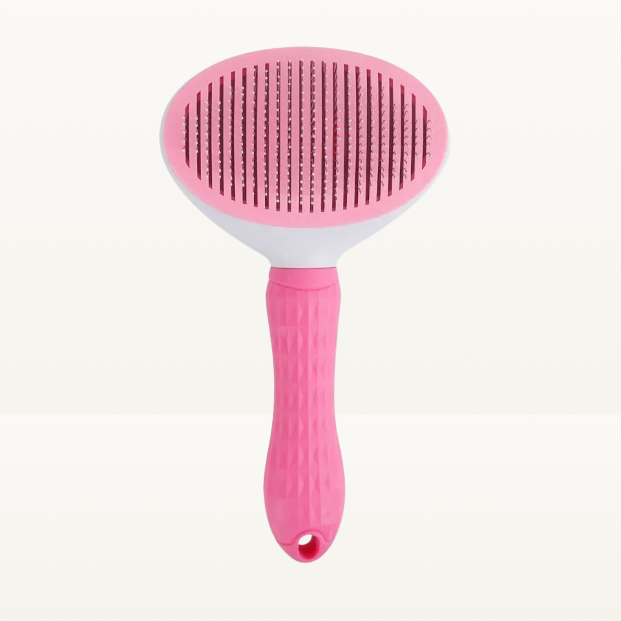 Brosse auto-nettoyante rose pour chien et chat