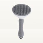 Brosse auto-nettoyante grise pour chien et chat